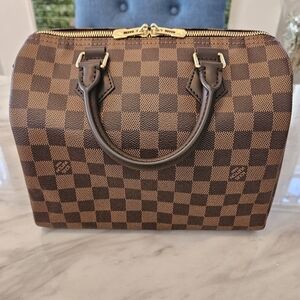 Louis Vuitton Brown Crossbody Bag with Iconic Checkered Design